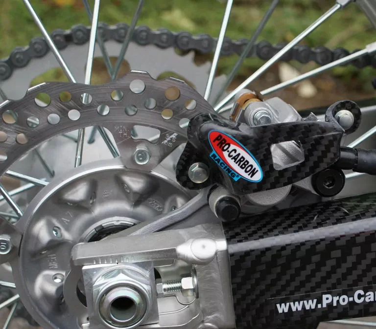 Pro Carbon achter remklauw beschermer Honda CR/CRF 125/250/450 2002-2023
