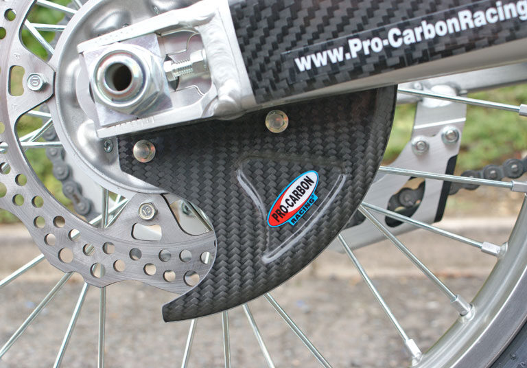 Pro Carbon achter remschijf beschermer alle Kawasaki ALL KX / KXF 125 TO 450 2003-2024